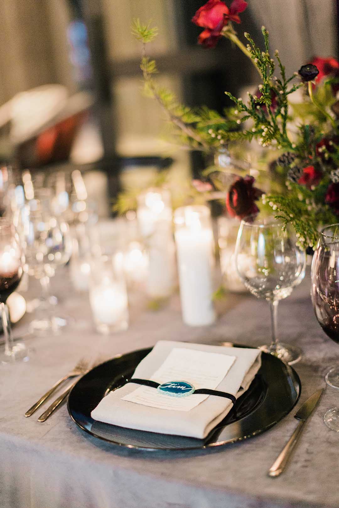 Place-setting with calligraphed agate place card and custom calligraphy menu