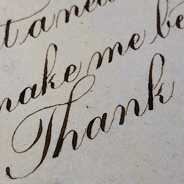 Close up on Calligraphic Song Lyrics by Katie Leavens
